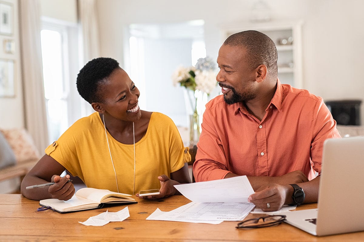 Couple budgeting together-Have Trouble Sticking To A Budget? These Tips Can Help!