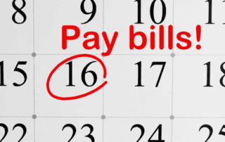 Close-up of a calendar page with the 16th circled in red and “Pay bills!” written above it, symbolizing mounting payment deadlines and the need to seek debt help from Andrea Orr, Licensed Insolvency Trustee in Windsor.